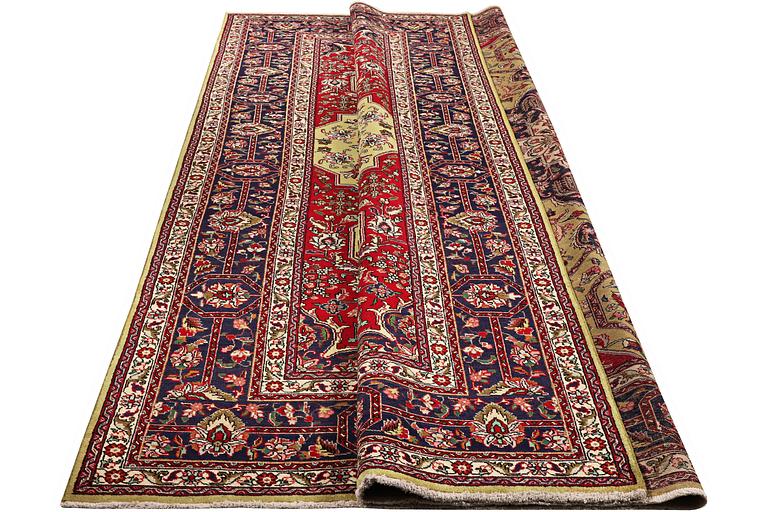 A carpet, Tabriz, ca. 384 x 301 cm.