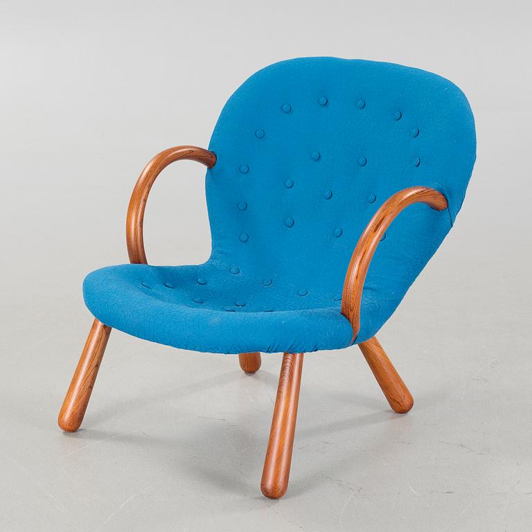 A "Clam Chair" / "Muslinge" chair, attributed to Philip Arctander, mid 20th cenutry.