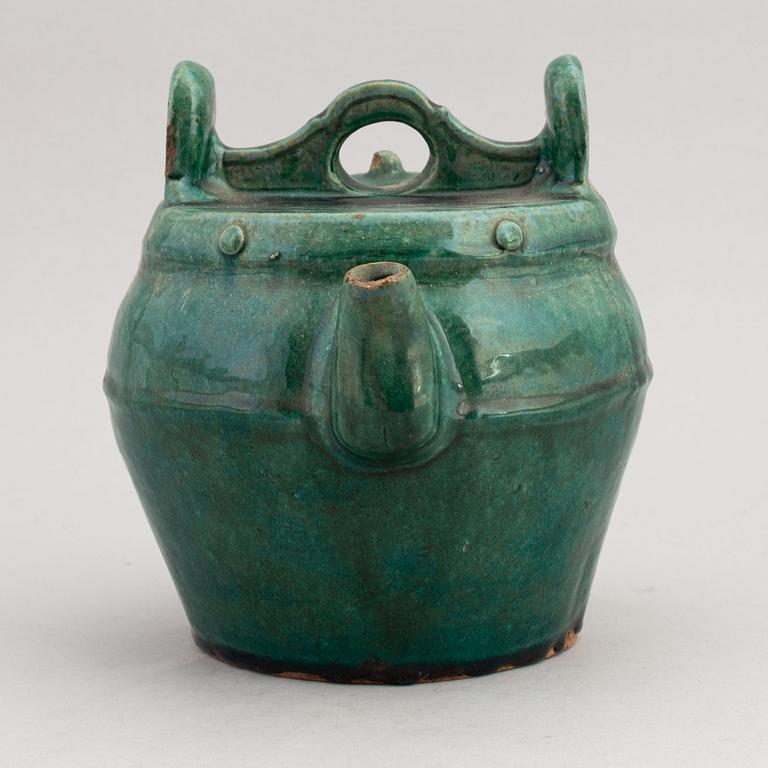 A Chinese green glazed 'Shiwan' ceramic teapot in the shape of a water bucket, 19th Century.