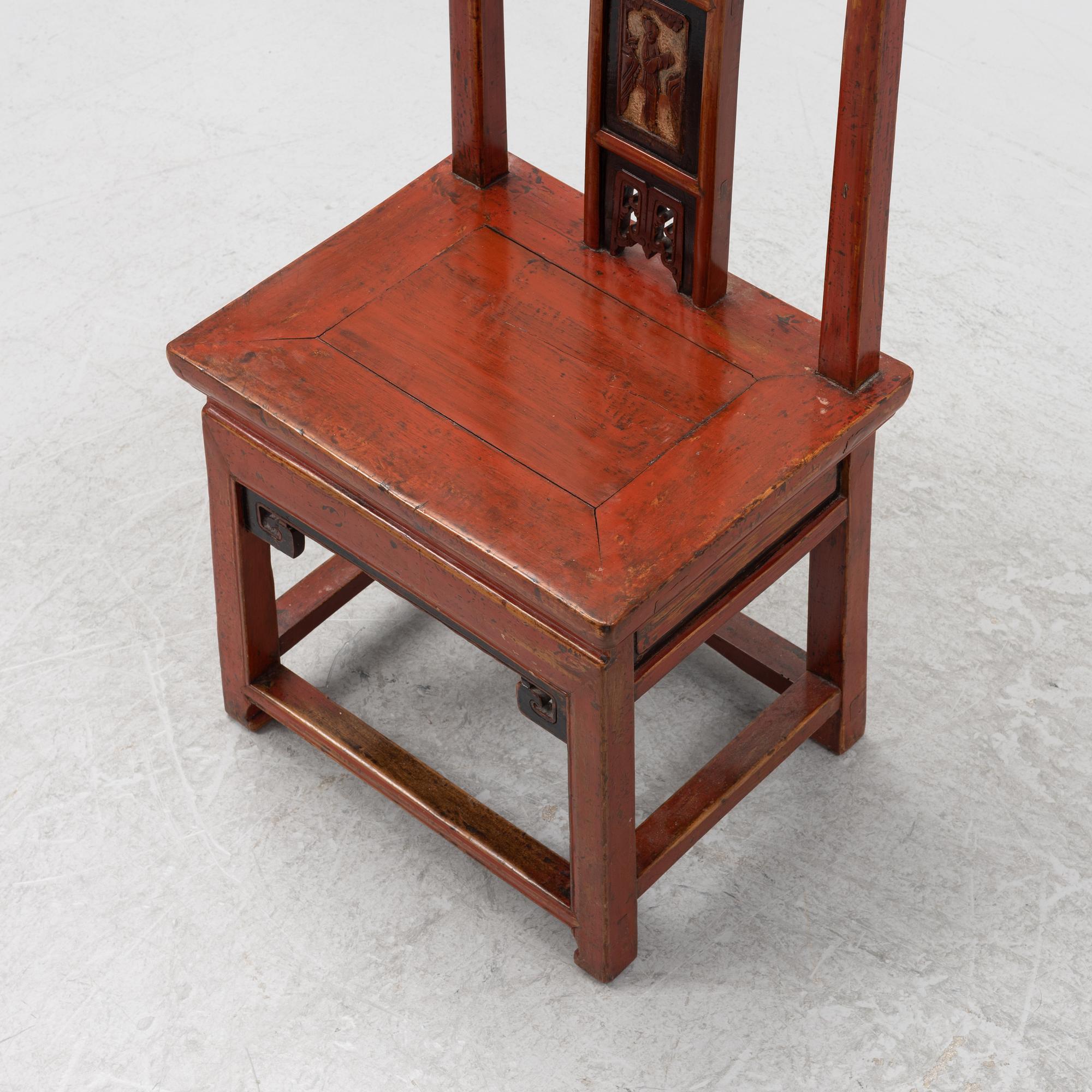 A red-lacquered chair, China, Qingdyansty, late 19th century.
