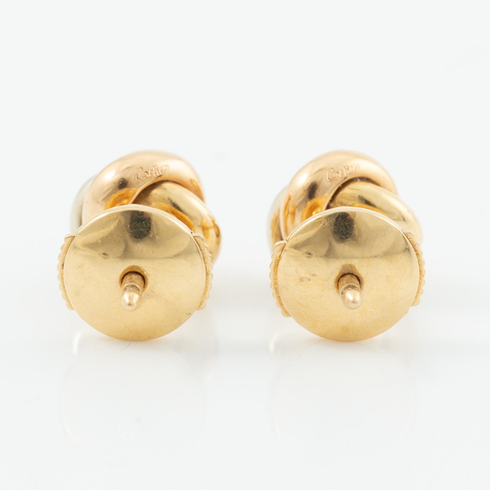 Cartier, earrings, a pair, "Trinity" 18K gold with round brilliant-cut diamonds.