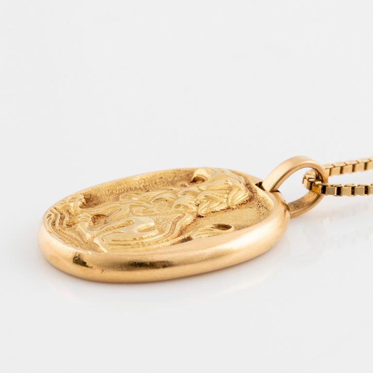 A Cartier Leo zodiac pendant.