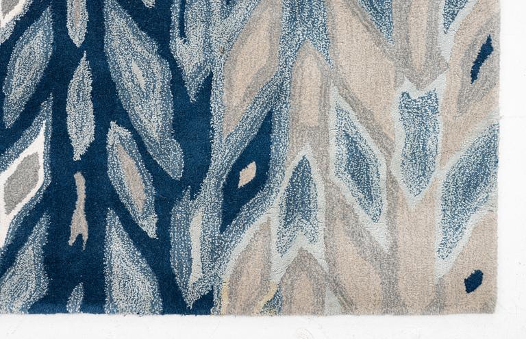 William Yeoward, a 'Kalata Indigo' carpet, circa 425 x 300 cm.
