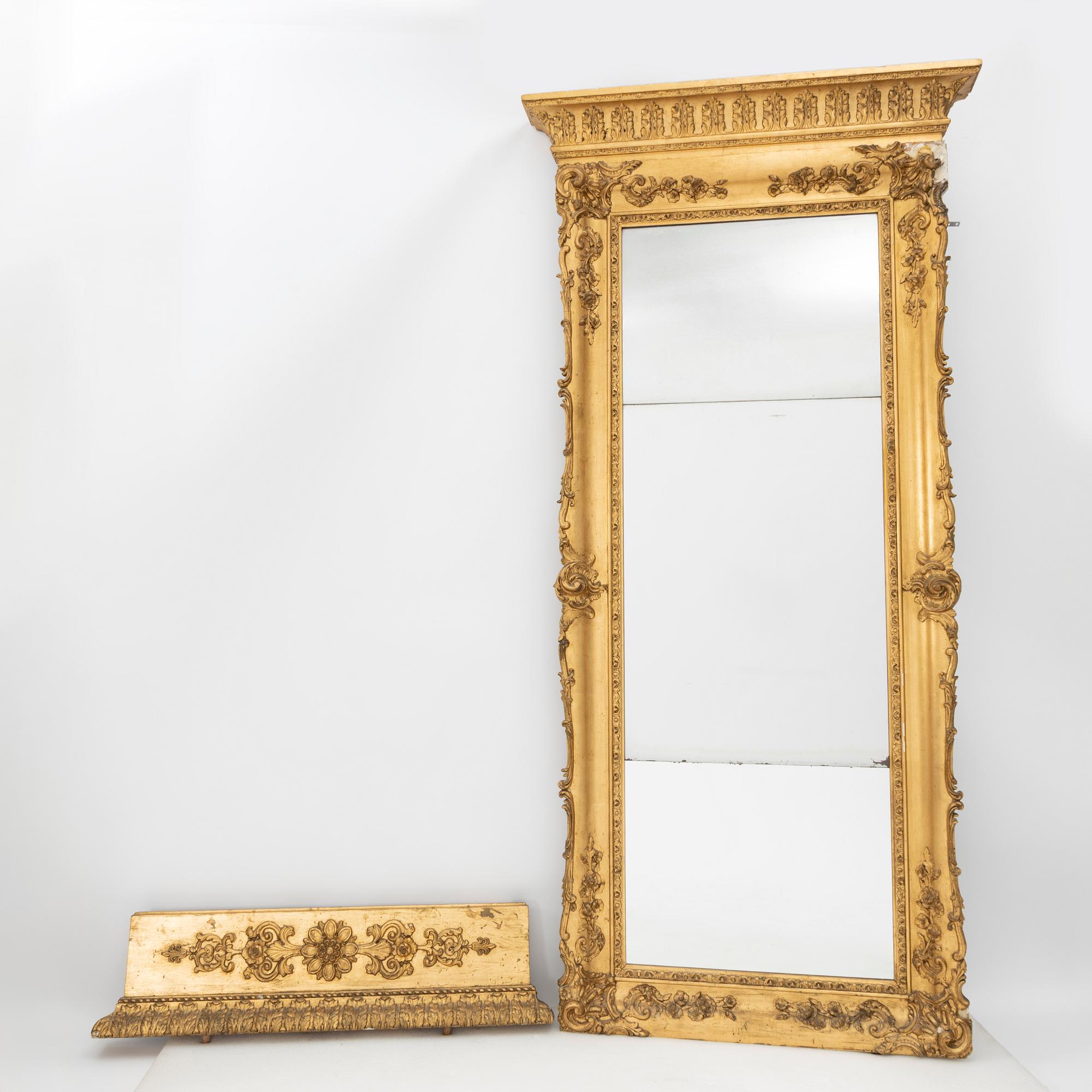 A Rococo style mirror, late 19th Century.