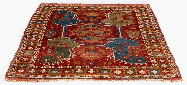A 17th century 'four-lobed-star-medallion rug', central Anatolia, c. 193 x 134 cm.