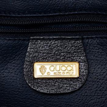 a 1980's Gucci bag and purse.