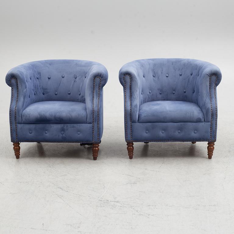 A pair of club armchairs, 21st century.