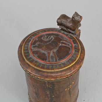 A 19th century painted wooden tankard.