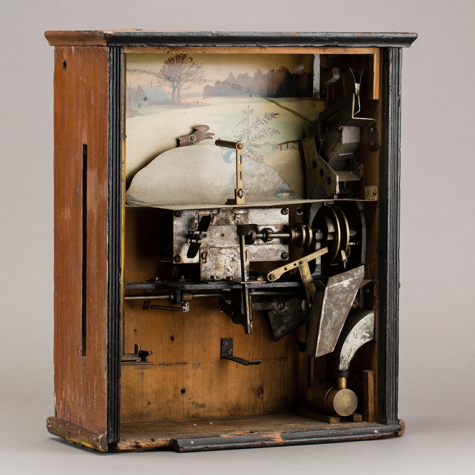 AMUSEMENT MACHINE, early 20th century.