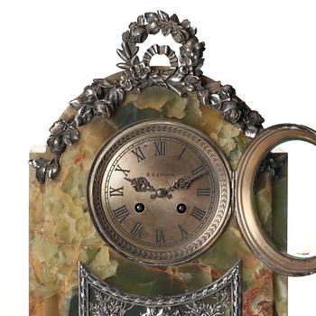 A silver jubilee hardstone and silver mantle clock by W.A. Bolin, Moscow 1912-1017.