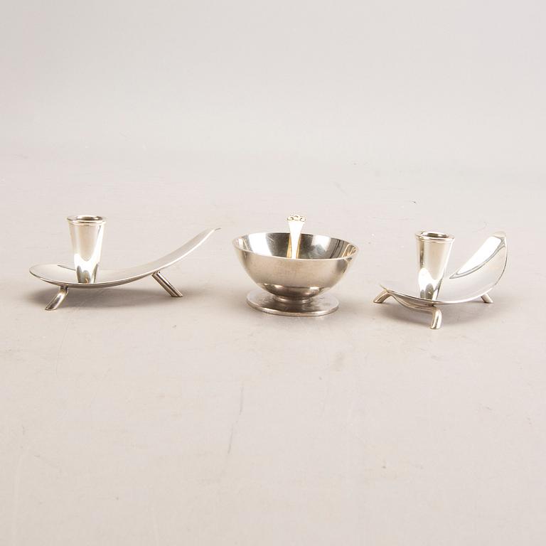 A 20th century Danish salter mark of H Hansen 1937 and two unmarked candlesticks total weight 151 gr.