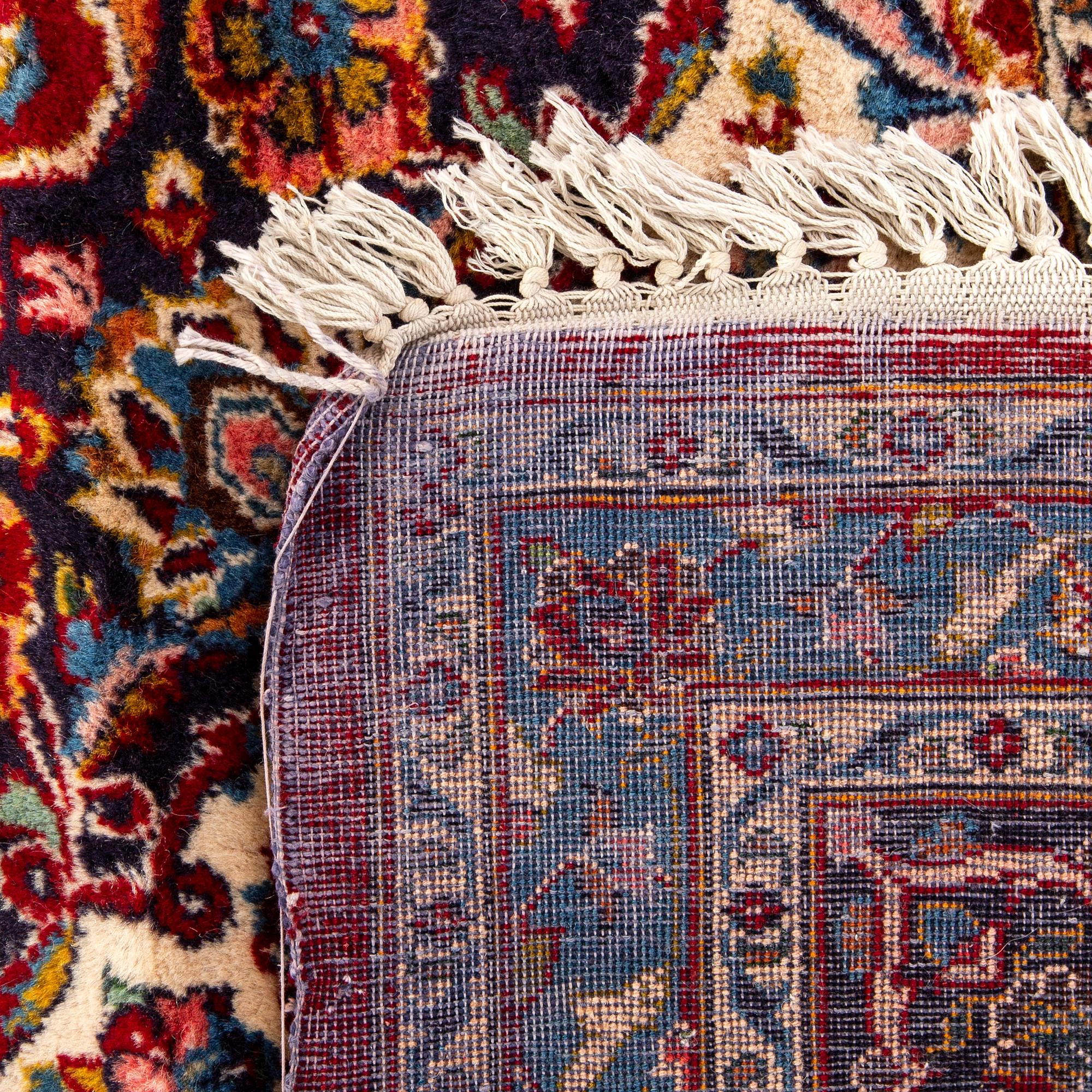 An old Kirman carpet ca 369 x 273 cm.