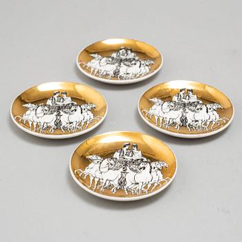 PIERO FORNASETTI, 9 parts, including 5 ashtrays, one plate, one vase and salt and peppercellars, Italy, 1950's -.