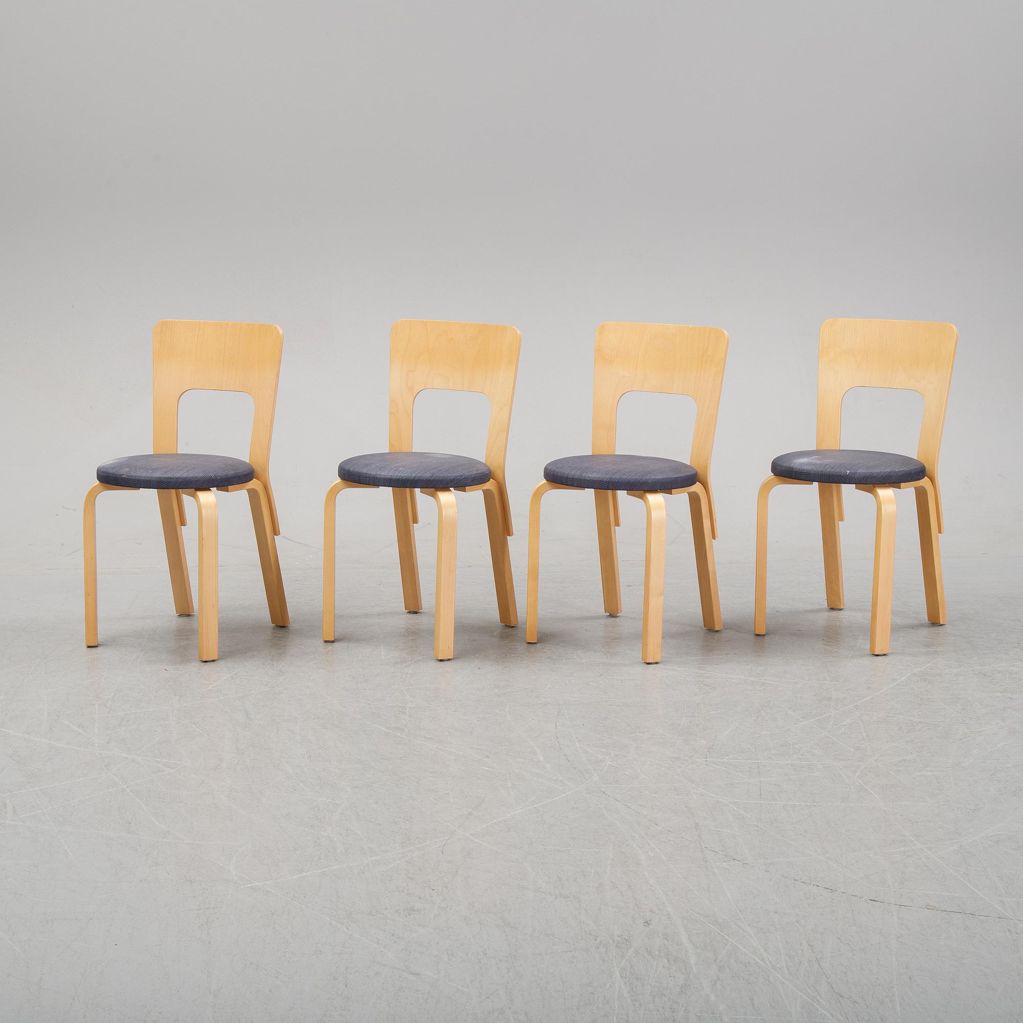 An 'Aalto' table and four chairs model 66 by Alvar Aalto for Artek, designed 1935.