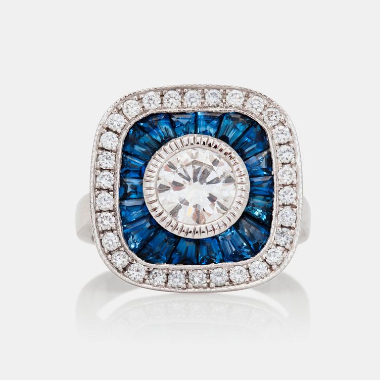 A sapphire and brilliant-cut diamond ring.