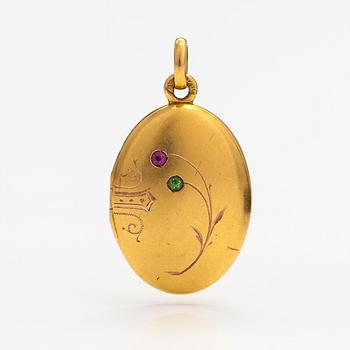 Medaljonki, 14K kultaa, rubiini ja denamtoiidigranaatti. Pietari, 1908-26.