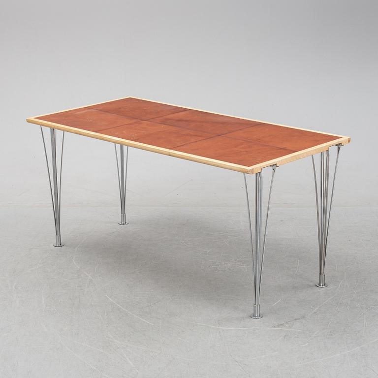 A birch and leather dining table produced by Mathsson International, 21th century.