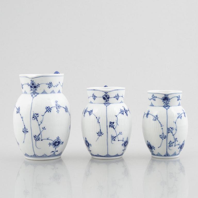 Three 'Blue Fluted' / 'Musselmalet' porcelain milkjugs, Royal Copenhagen, model 159, 450, 459, 1893-1900 and later.