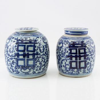 A set of two Chinese blue and white jars with covers, 20th century.