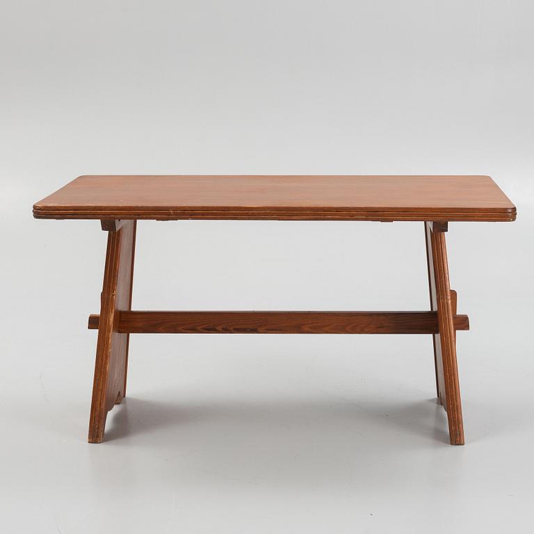 Göran Malmvall, a pine dining table and three chairs, mid 20th century.