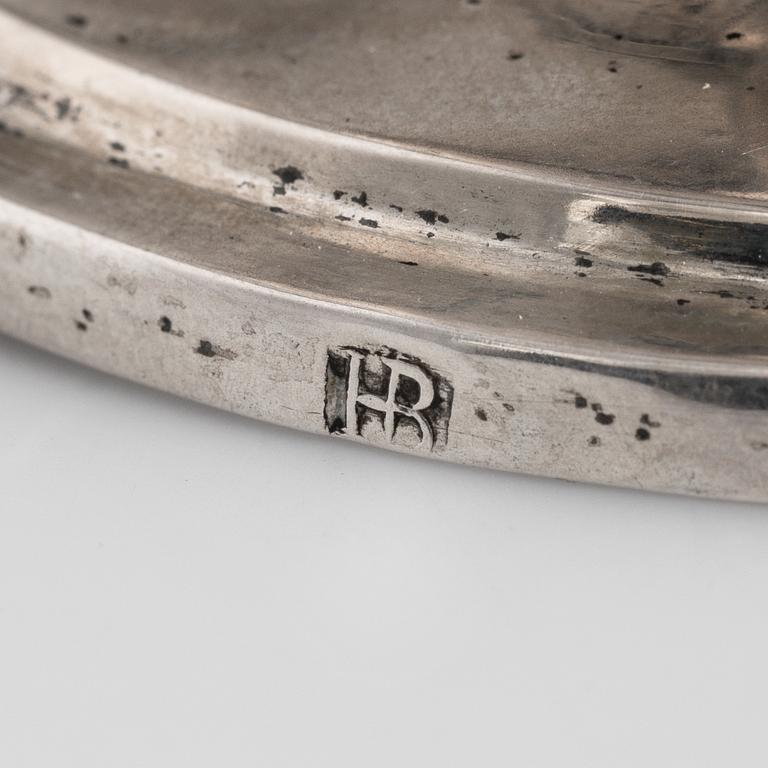 A pair of firt half of the 19th century parcel-gilt silver salt-cellars by an uknown master, one marked HB.