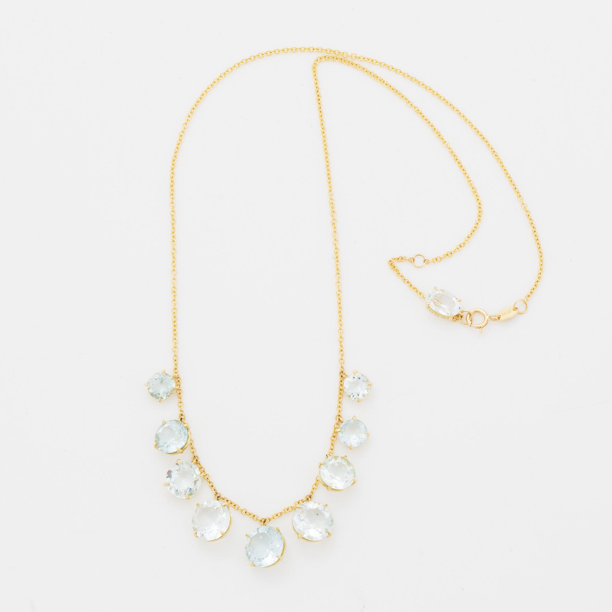 Collier, med runda fasettslipade akvamariner.