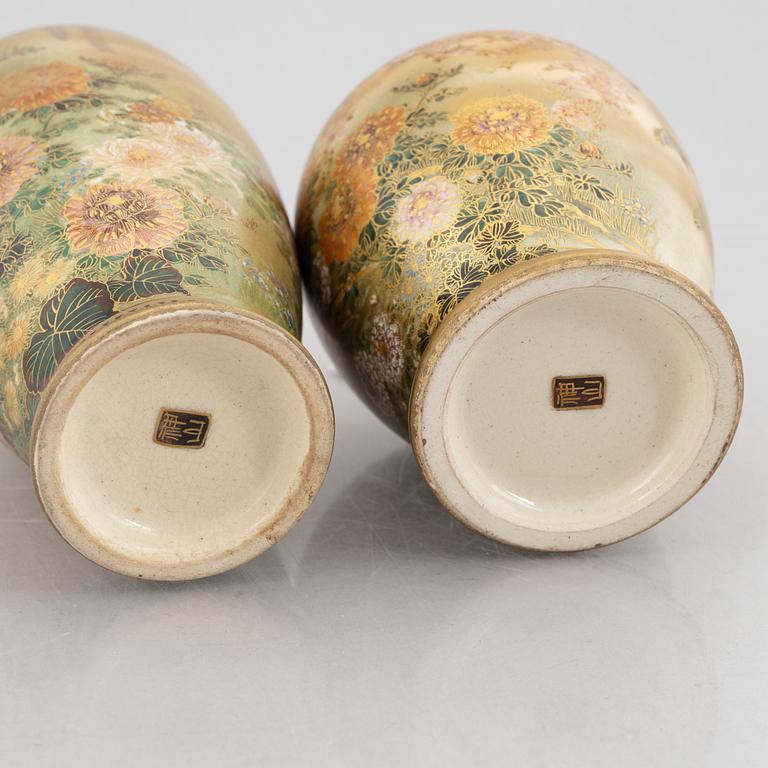 A pair of Satsuma-ware porcelain vases, signed Hizan, Japan, Meiji (1868-1912).