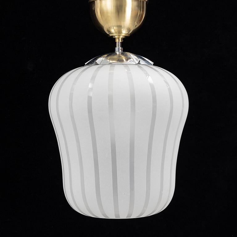 A Swedish Modern glass and brass ceiling light, Orrefors, 1940's.