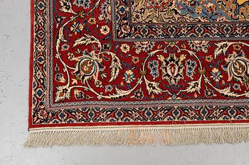 A carpet, Old Esfahan, part silk, ca 311 x 201 cm.