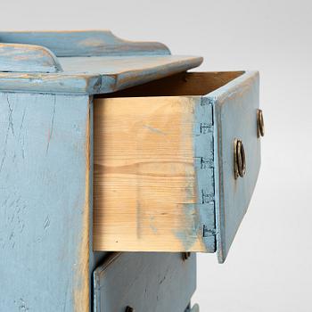 A 19th century chest of drawers.