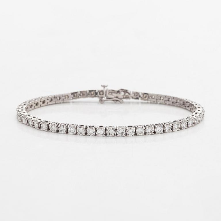 Tennis bracelet, brilliant cut diamonds, 18K white gold.