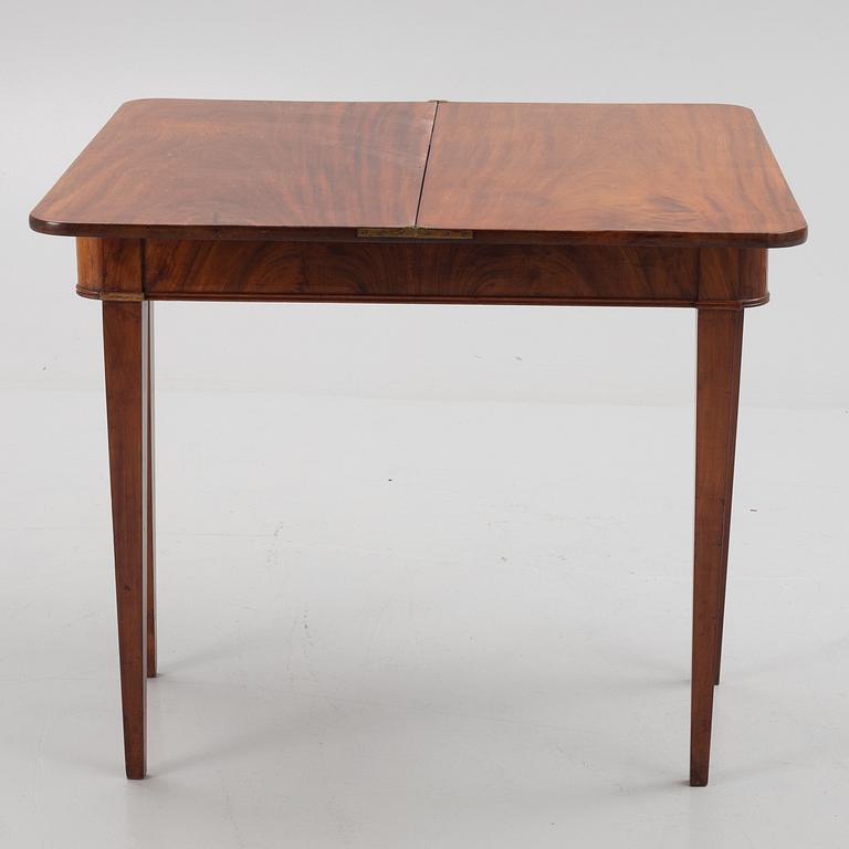 A mahogany games table, second half of the 19th Century.