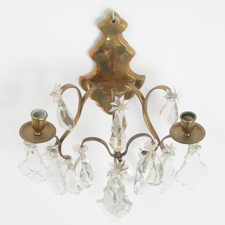 A pair of Louis XV-style wall sconces, early 20th Century.