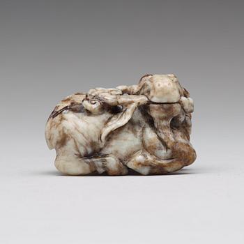 492. A carved nephrite figurine, late Ming dynasty (1368-1643).