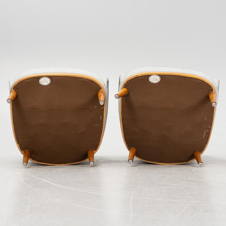 Carl Malmsten, attributed to. A pair of inlay easy chairs, mid 20th Century.