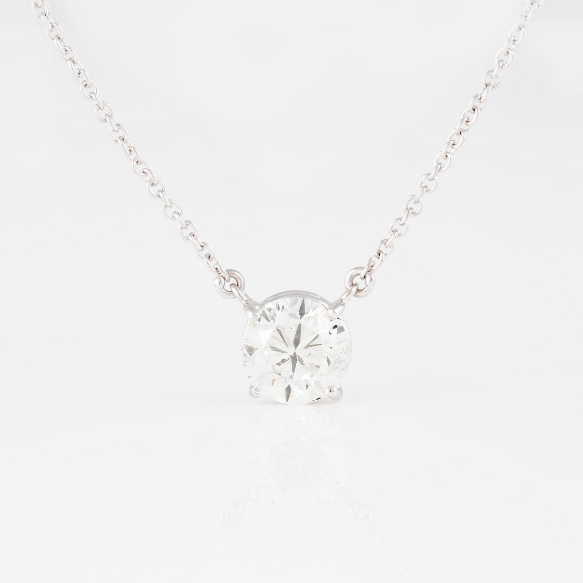 HÄNGE, med briljantslipad diamant ca 1.52 ct. Vikt 4,7 gram.