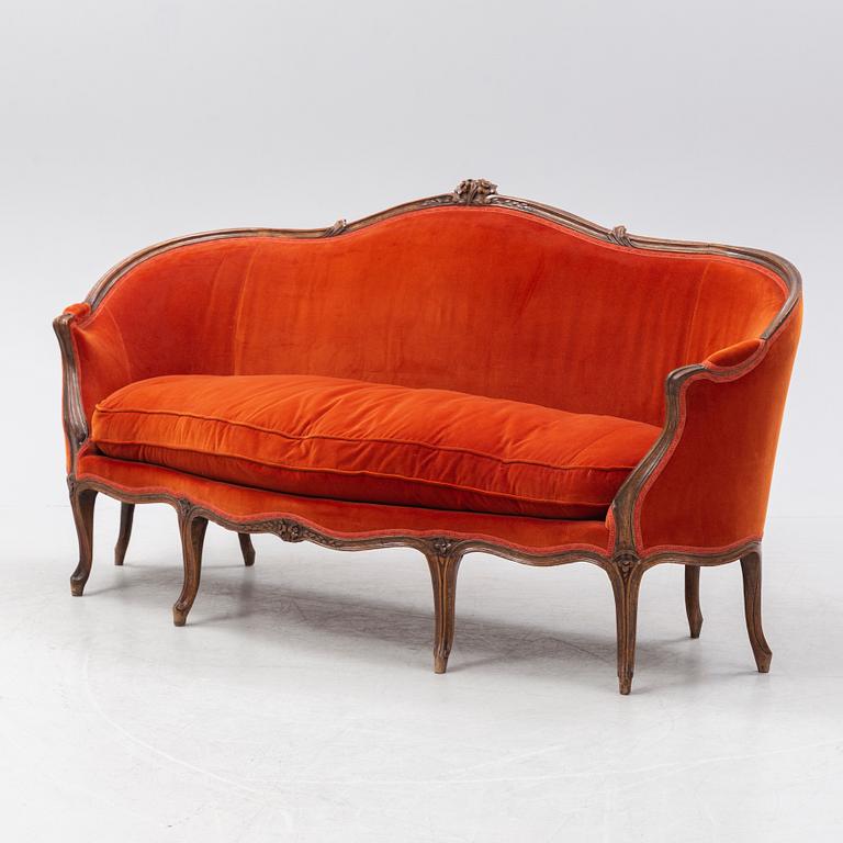 A Louis XV sofa, France, mid 18th Century.