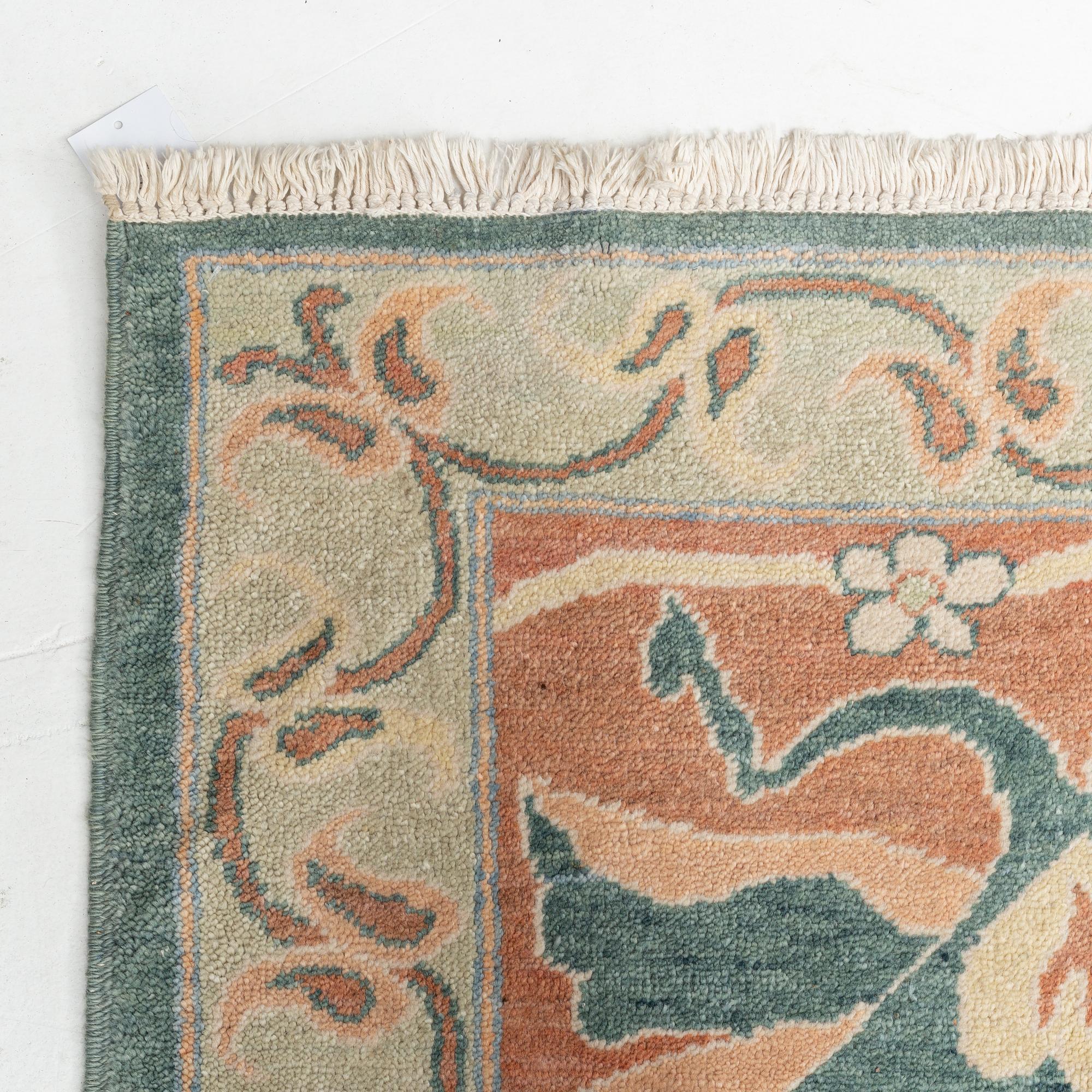 A Carpet, Arts & Crafts Design, circa 604 x 424 cm.
