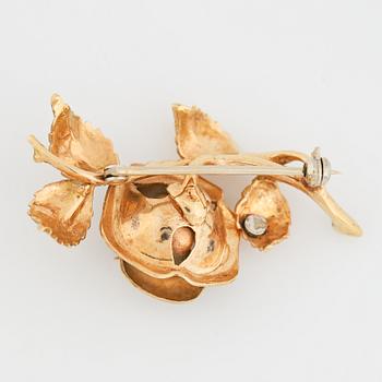 18K gold rose brooch.