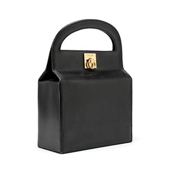 500. CÉLINE, a black leather evening bag, from the 1950/60s.