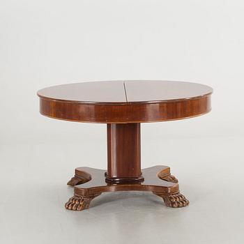 AN EMPIRE STYLE TABLE FROM AROUND 1900.