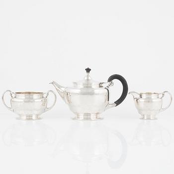 A Norwegian Silver Teapot, Sugar Bowl and Creamer, mark of David Andersen, Oslo circa 1923.