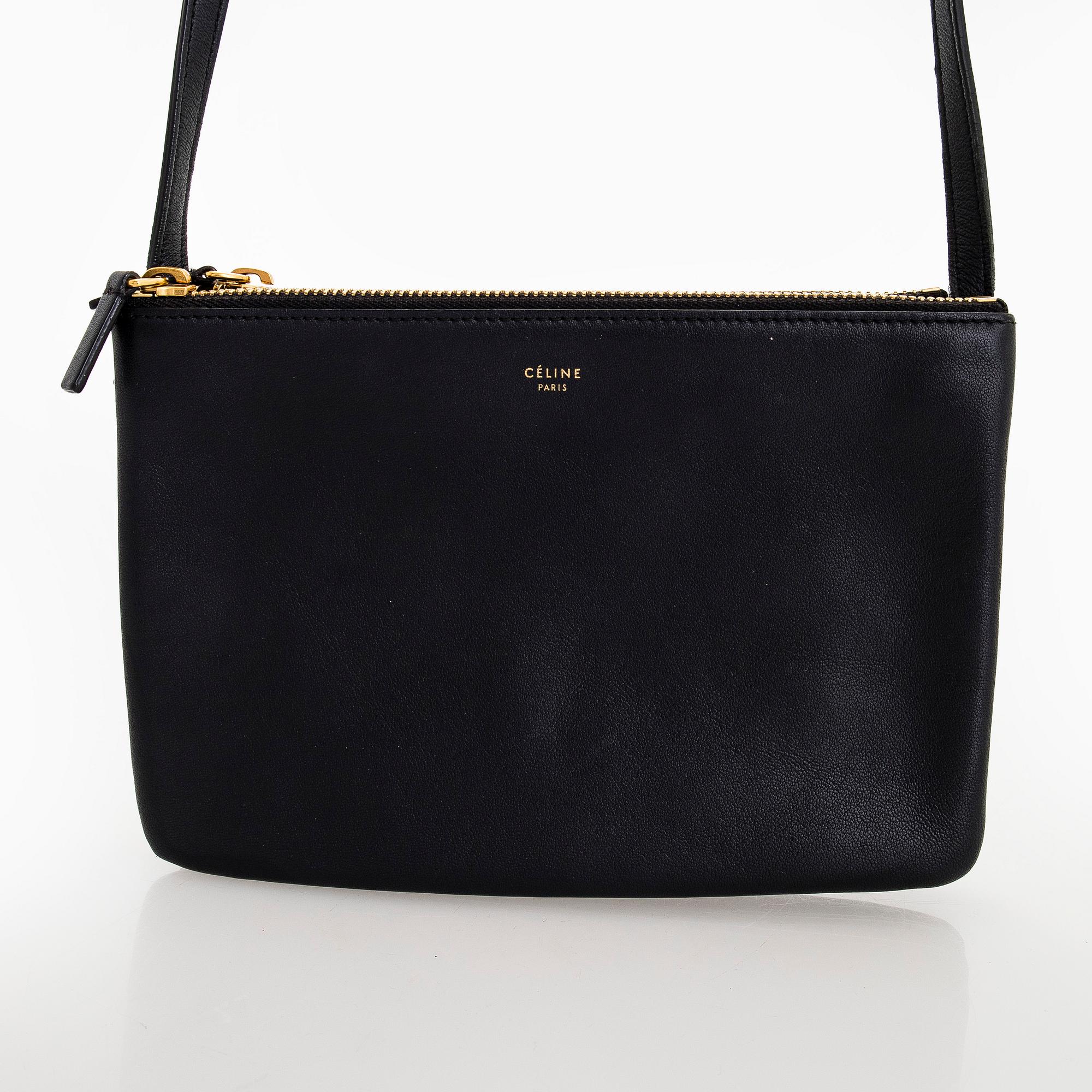Céline, a black leather 'Trio Small' bag.