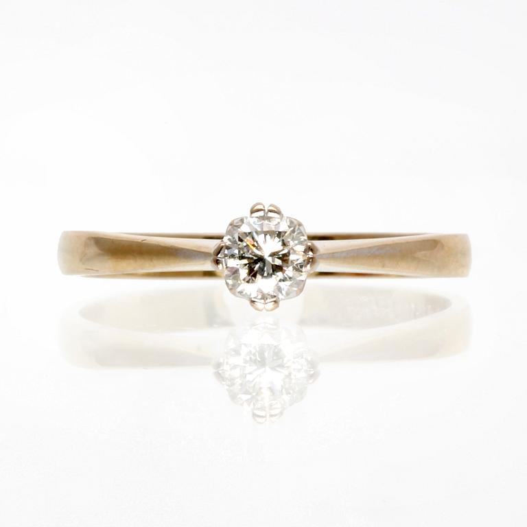 Diamondring 18K whitegold 1 brilliant-cut diamond 0,30 ct inscribed W/TCR VVS, valuation letter Gemmologica AB Stockholm.
