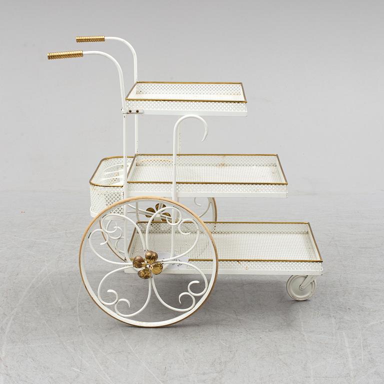 A white lacquered metal and brass serving trolley, 1940's-50's.
