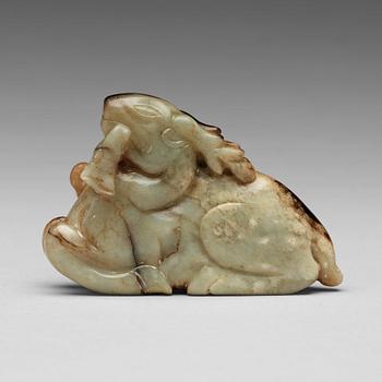 601. A carved nephrite figure of a reclining deer, late Qing dynasty.