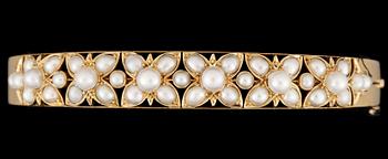 ARMRING, 14k guld och pärlor Vikt 24,1g.