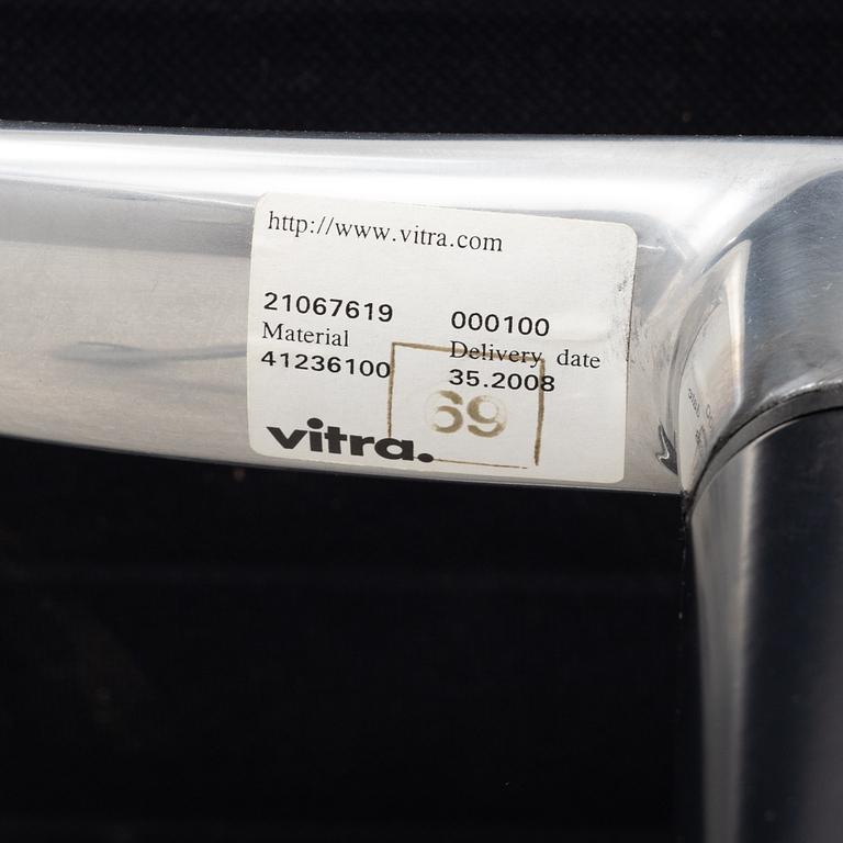 An EA 108 swivel office chair by Charles and Ray Eames for Vitra.