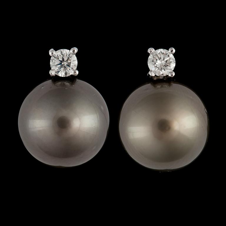 A pair of cultured Tahiti pearl, Ø 12 mm, and brilliant-cut diamond, 0.26 ct in total, earrings.