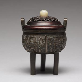 A tripod bronze censer Qing dynasty, 19th Century.